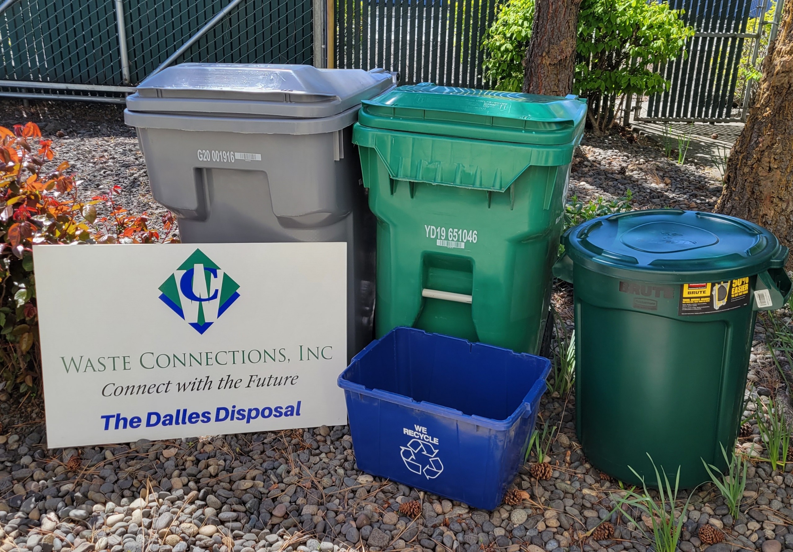 The Dalles Disposal residential trash and recycling bins.